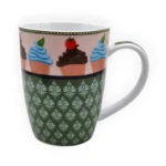 Porslinsmugg med cupcakes. Muggen har måtten 11x8,5 cm (hxdia). Tål mikro och maskindisk.