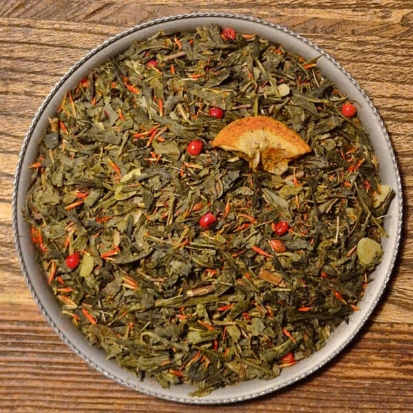 Grönt julte med smak av mandel och apelsin. Ett elegant te som förenar friskhet och värme, med klassisk juldoft och len mandelton.