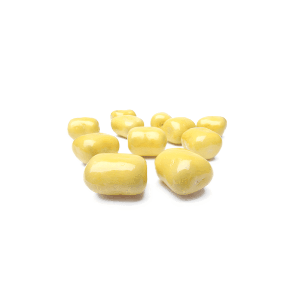 Lakrits dragerad med vit choklad och citron. En träffsäker harmoni där saltlakrits möter frisk citron och len vit choklad.